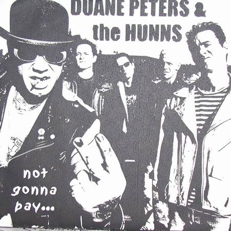 Duane Peters and the Hunns...One of these versions is a first pressing...both are numbered